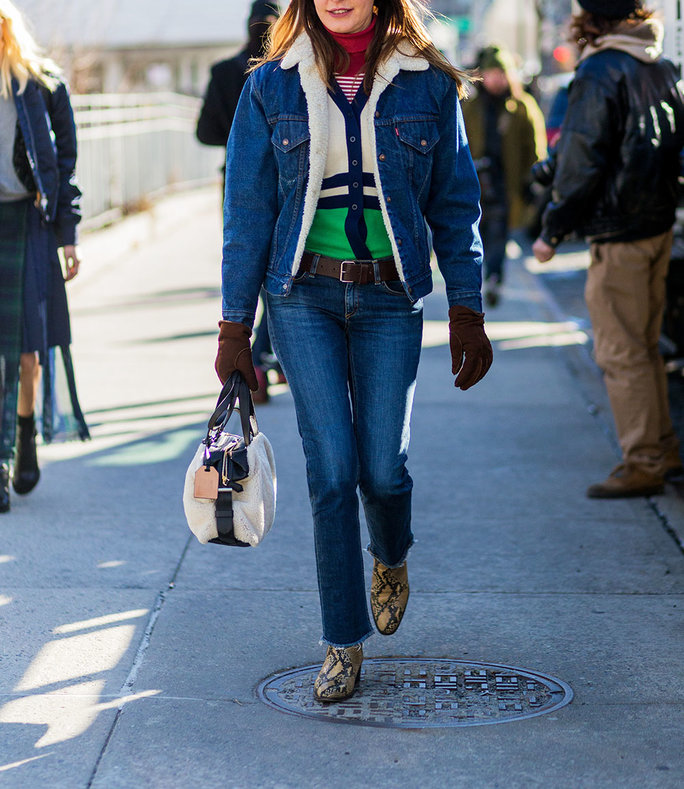 NEW YORK, NY - FEBRUARY 18:  Ece Sukan wearing a shearling denim jacket and denim jeans and brown gloves seen outside Calvin Klein during New York Fashion Week: Women's Fall/Winter 2016 on February 18, 2016 in New York City.  (Photo by Christian Vierig/Getty Images) *** Local Caption ***