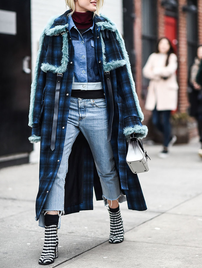 NEW YORK, NY - FEBRUARY 17:  Sofie Valkiers is seen outside the DKNY show wearing a blue and black plaid coat, blue shirt, blue jeans and black and white striped shoes during New York Fashion Week: Women's Fall/Winter 2016 on February 17, 2016 in New York City.  (Photo by Daniel Zuchnik/Getty Images)